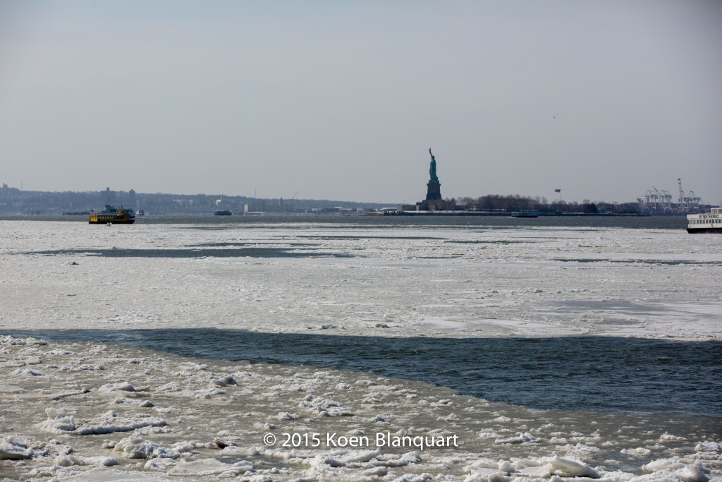 The NY Waterway ferry continues its original route towards Manhattan, after it assisted the Liberty Landing Ferry Service Ferry to get out of the ice